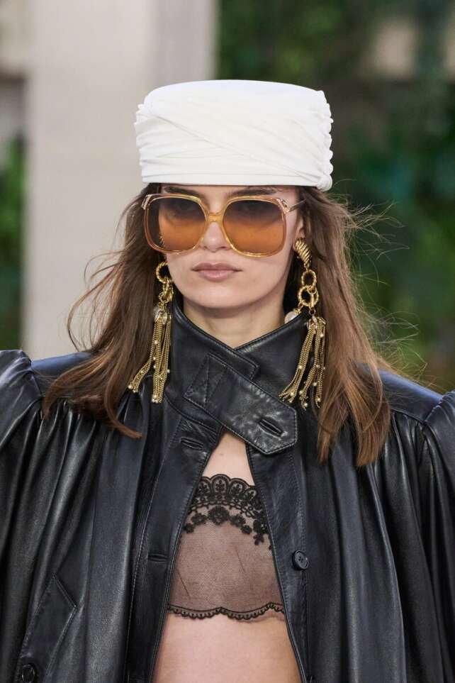 Loewe Spring 2025 Collection: Shell Coats, Feather T-Shirts, and Clown Boots